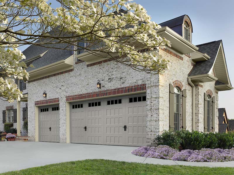 wood vs steel garage doors